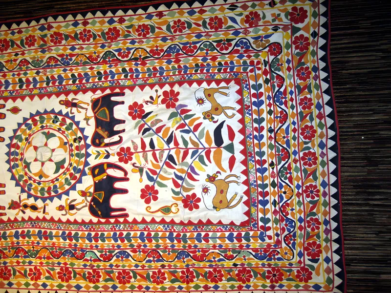 Embroidered medallions and horses, detail
