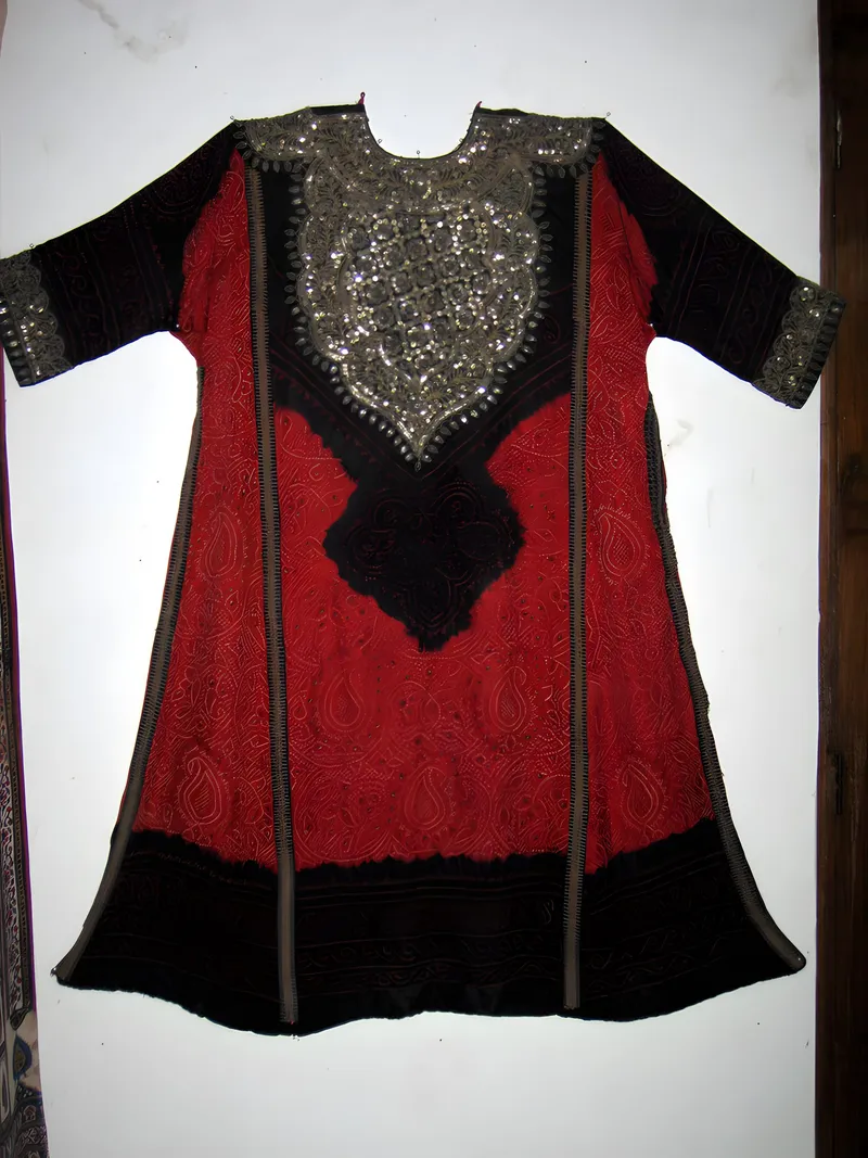Embroidered garment on red