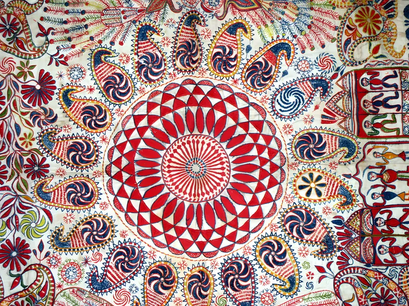 Densely stitched kantha medallion