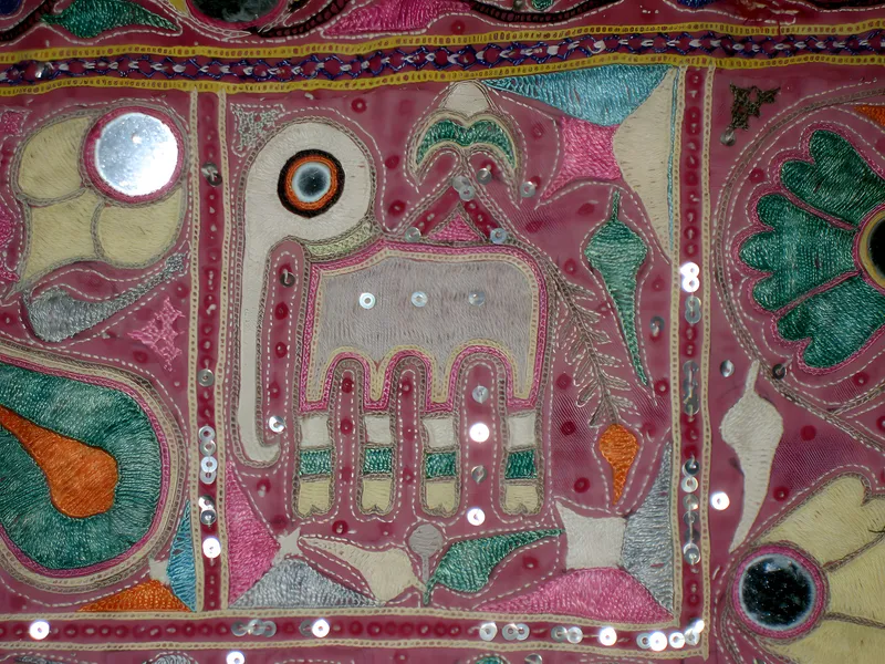 Mirror-work with peacocks