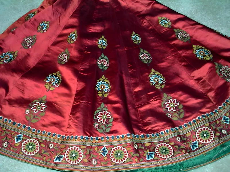 Red silk skirt with mochi embroidery