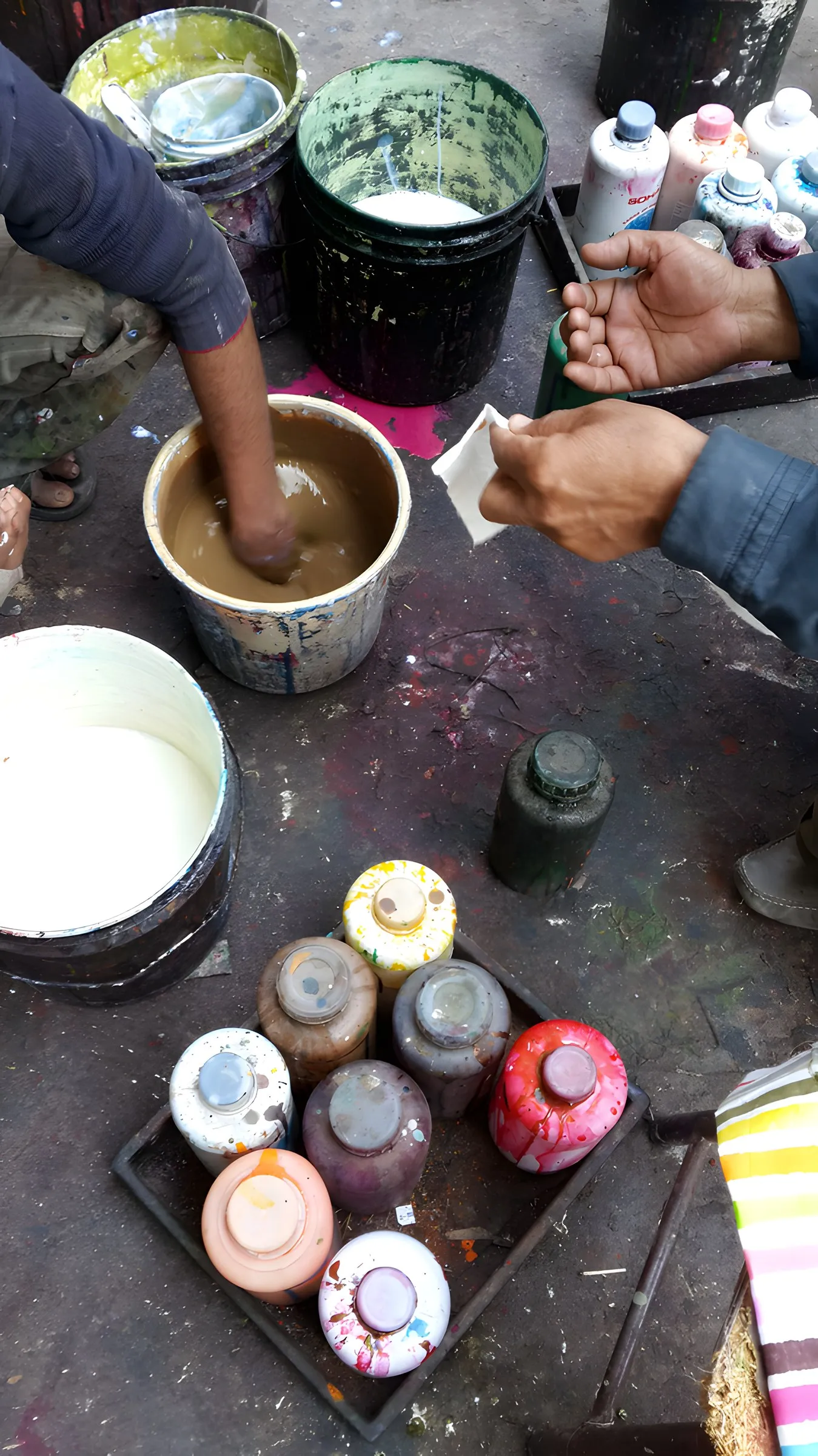 Pigment pots on the dyer's bench