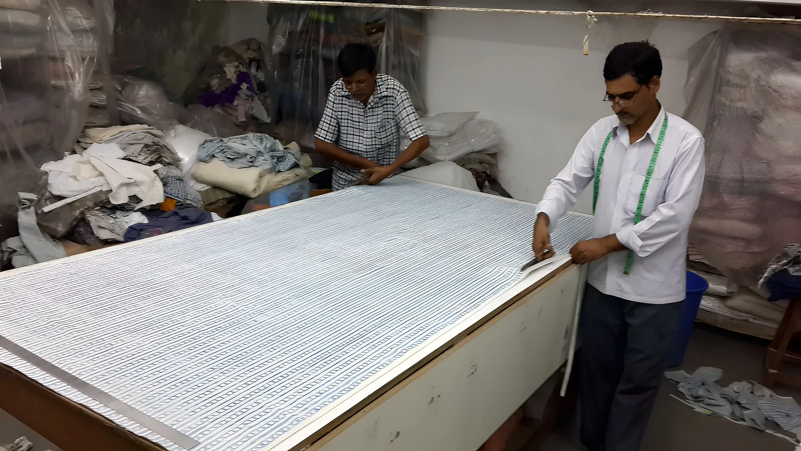 Checking a cutwork bedcover