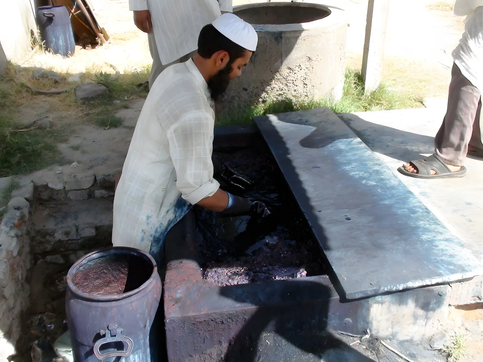 Working the dye into the cloth
