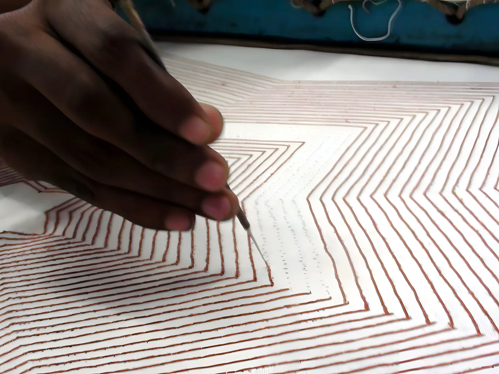 Running stitch on a stretched frame