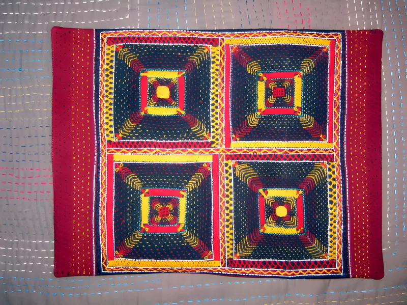 Appliqué cushion