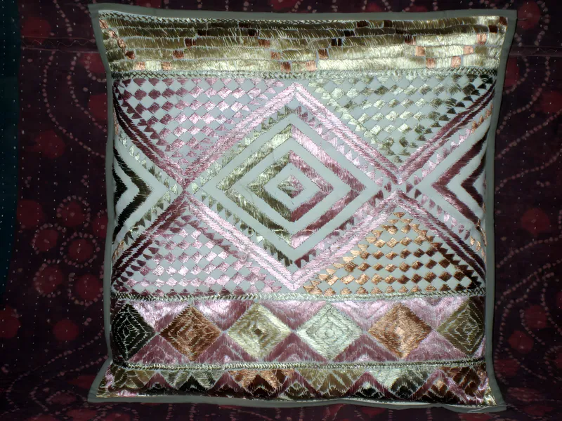 Embroidered silk cushion