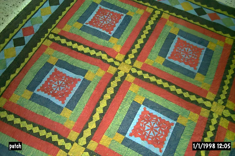 White appliqué cutwork bedcover