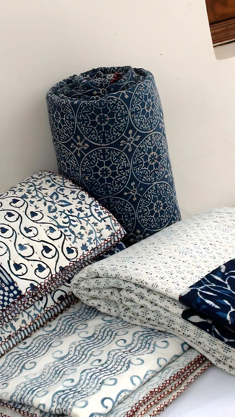 Hand-quilted indigo kantha quilt
