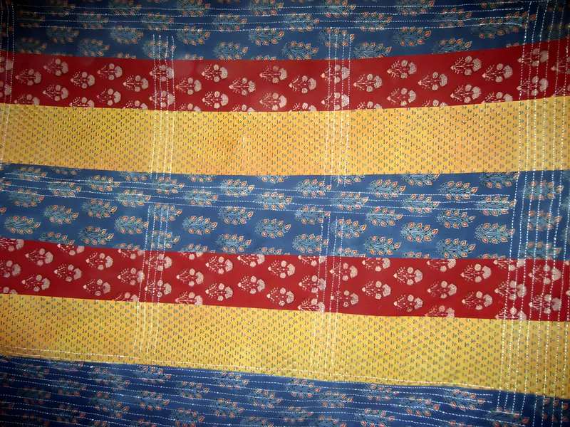 Block-printed patchwork quilt