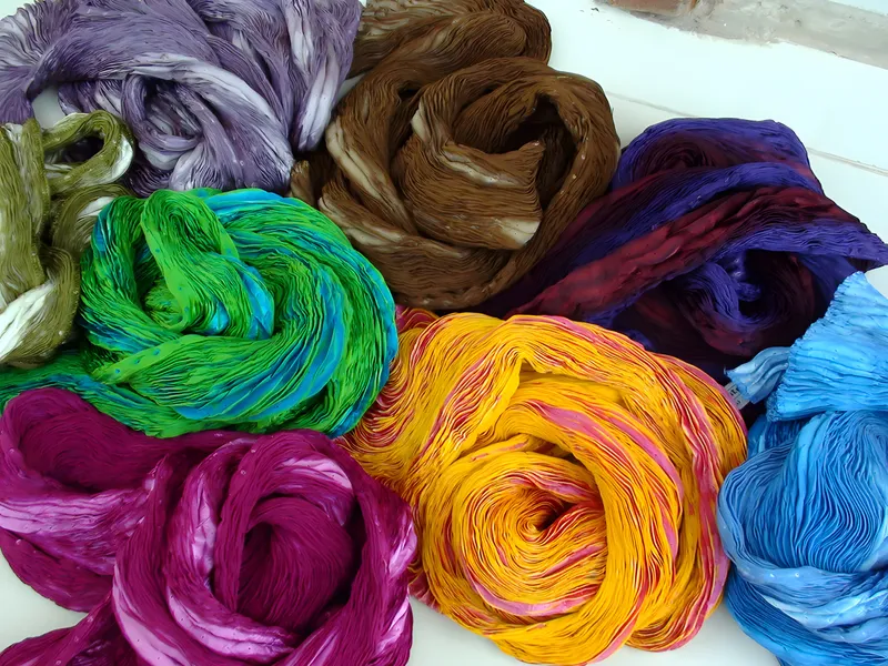 Silk scarves, rolled