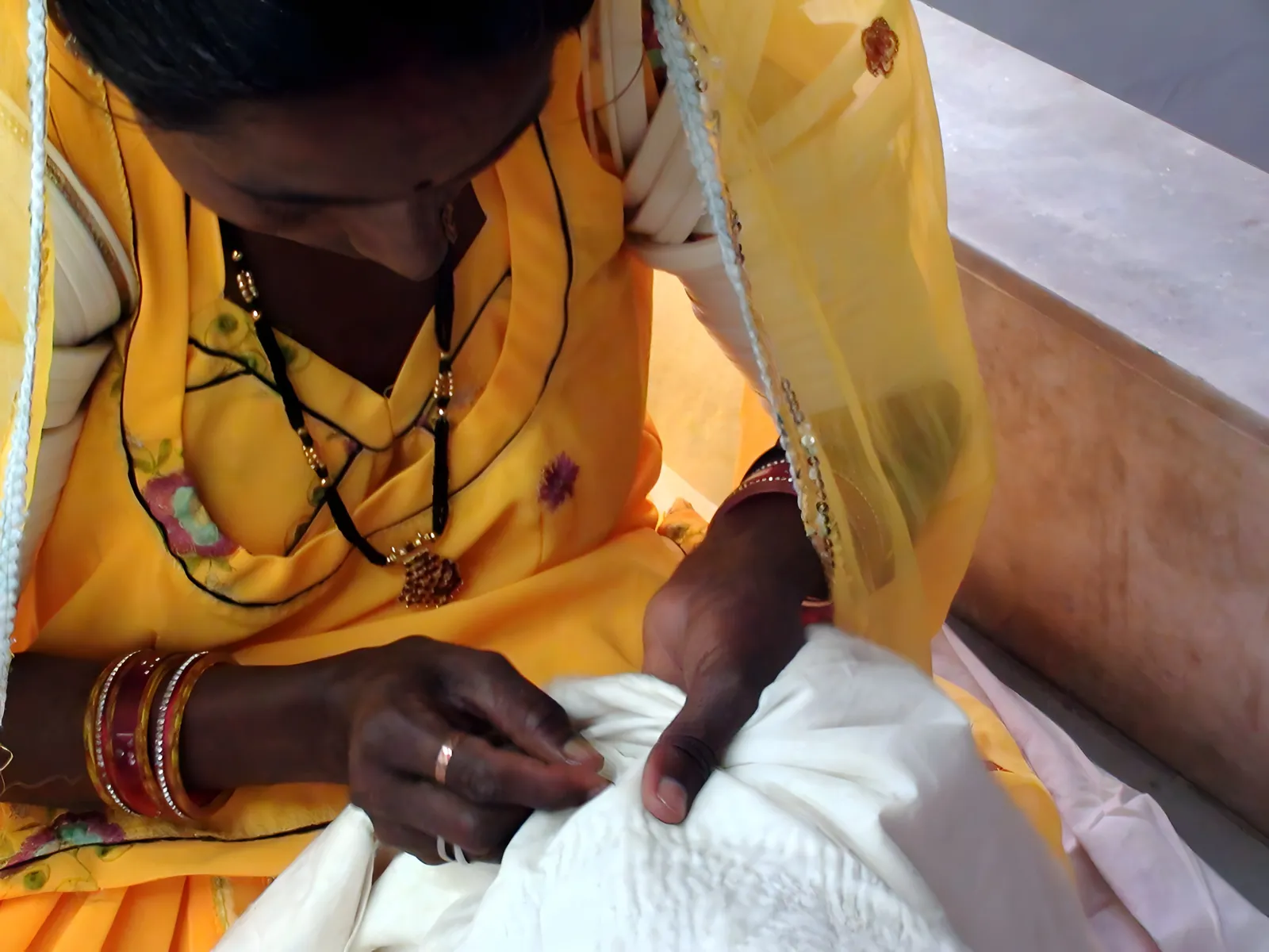 Running stitch through layers of soft cotton